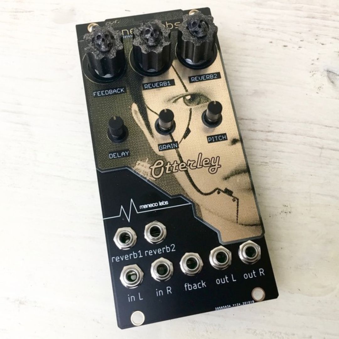 Angled view of Maneco Labs Otterley Reverb Module on light wood surface