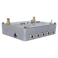 Angled top ports view of Maneco Labs Sixteen Second Delay Reissue Silver Pedal on white background