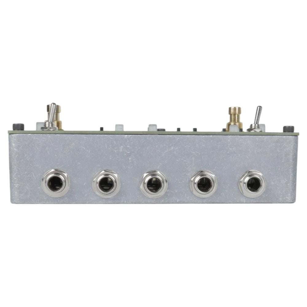 Top ports view of Maneco Labs Sixteen Second Delay Reissue Silver Pedal on white background