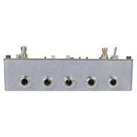 Top ports view of Maneco Labs Sixteen Second Delay Reissue Silver Pedal on white background
