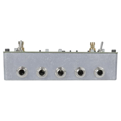 Top ports view of Maneco Labs Sixteen Second Delay Reissue Silver Pedal on white background