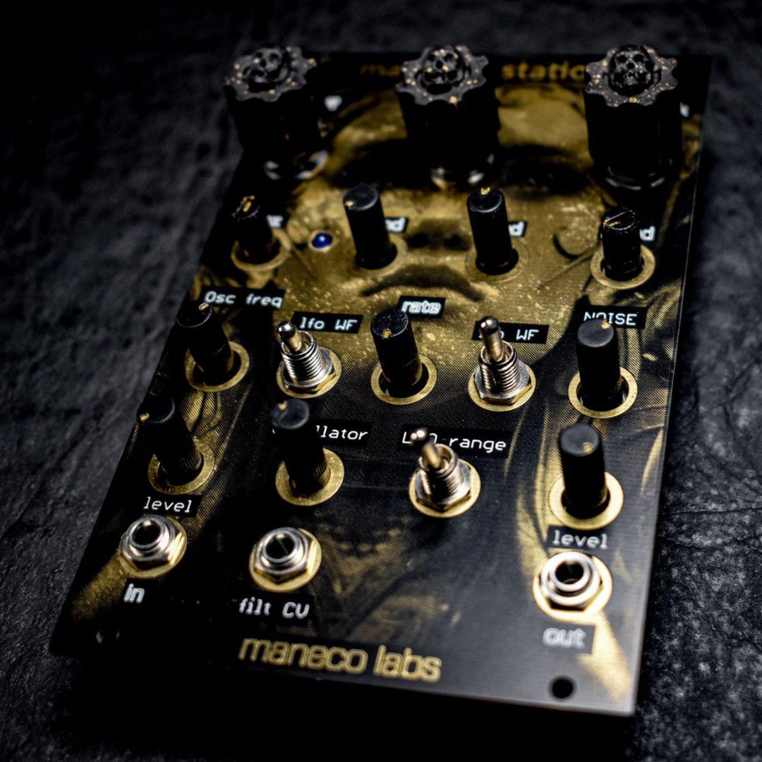 Angled front view of Maneco Labs man-eko station Module on black surface