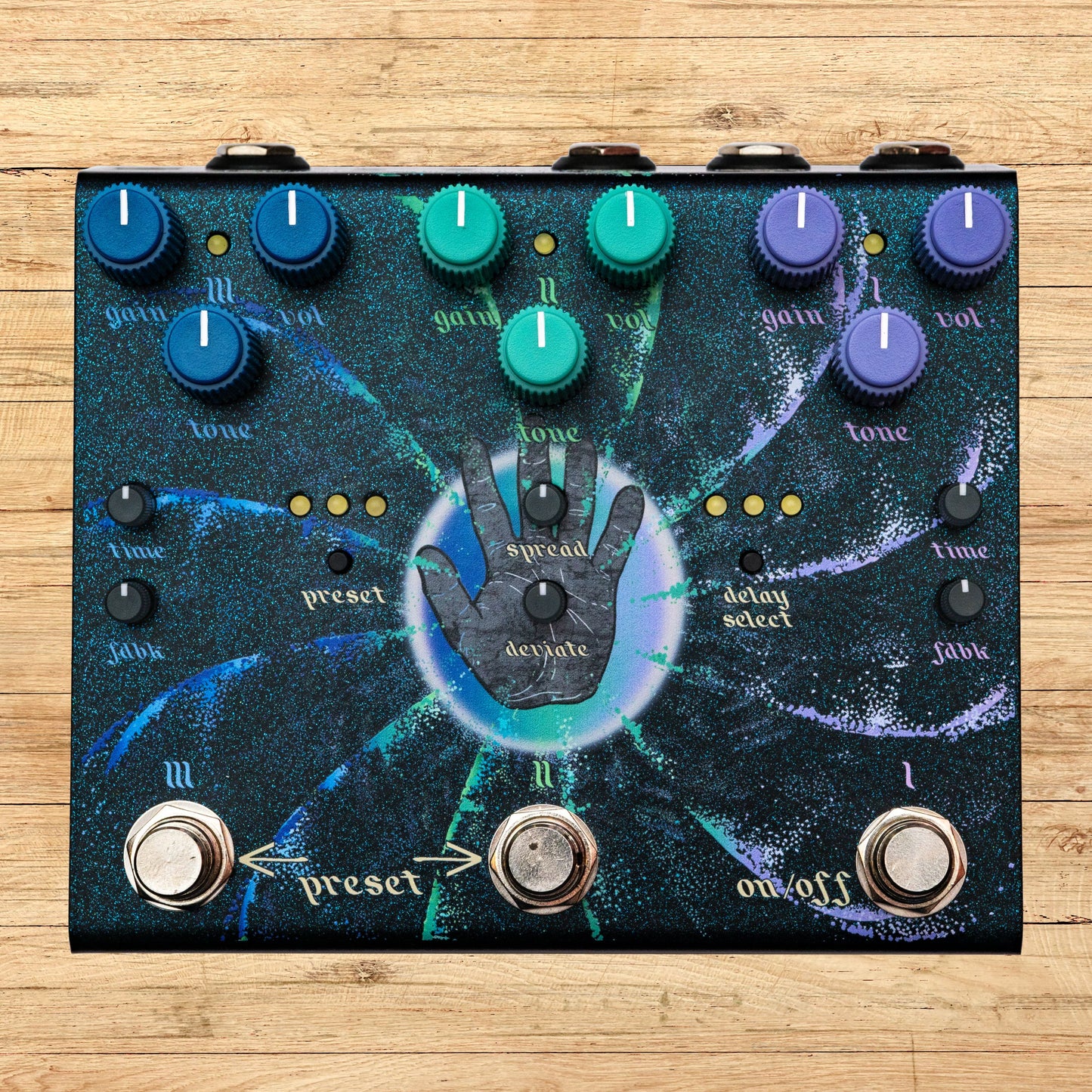 Front view of OBNE Beam Splitter V2 Pedal Cool on wooden surface