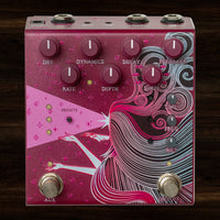 Front view of OBNE Sunlight Stereo Pedal Maroon on dark wood background