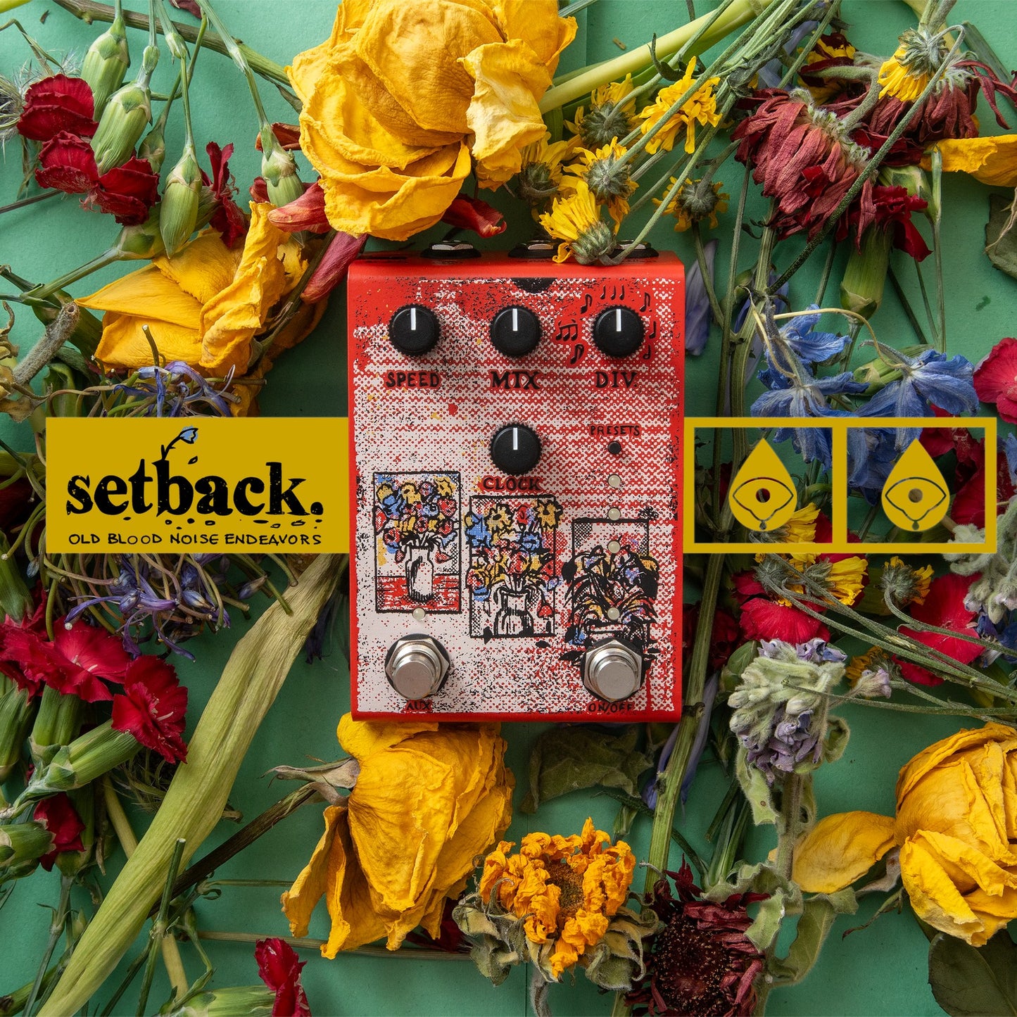 Front view of Old Blood Noise Setback Reverse Pedal laying on flowers on green surface