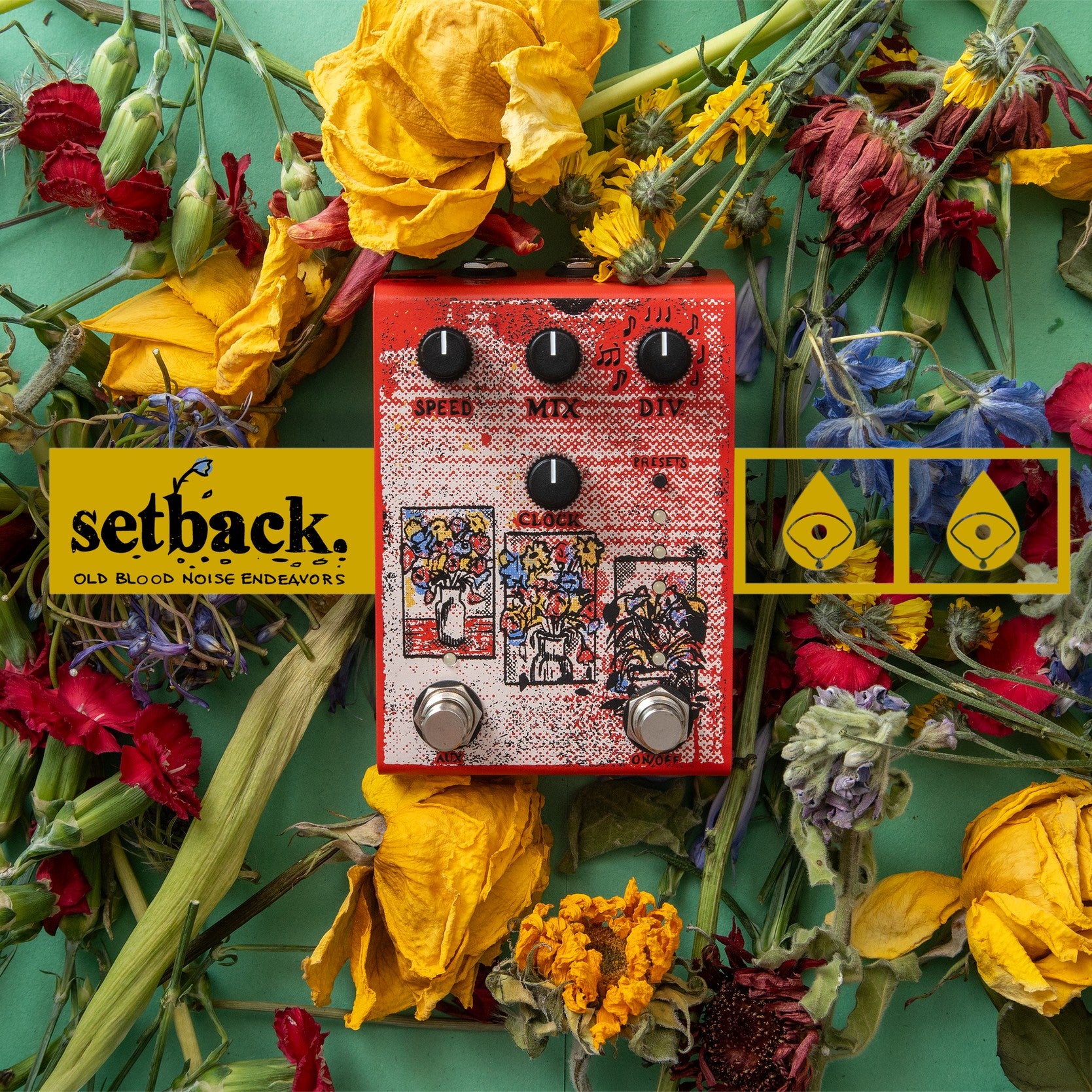 Front view of Old Blood Noise Setback Reverse Pedal laying on flowers on green surface