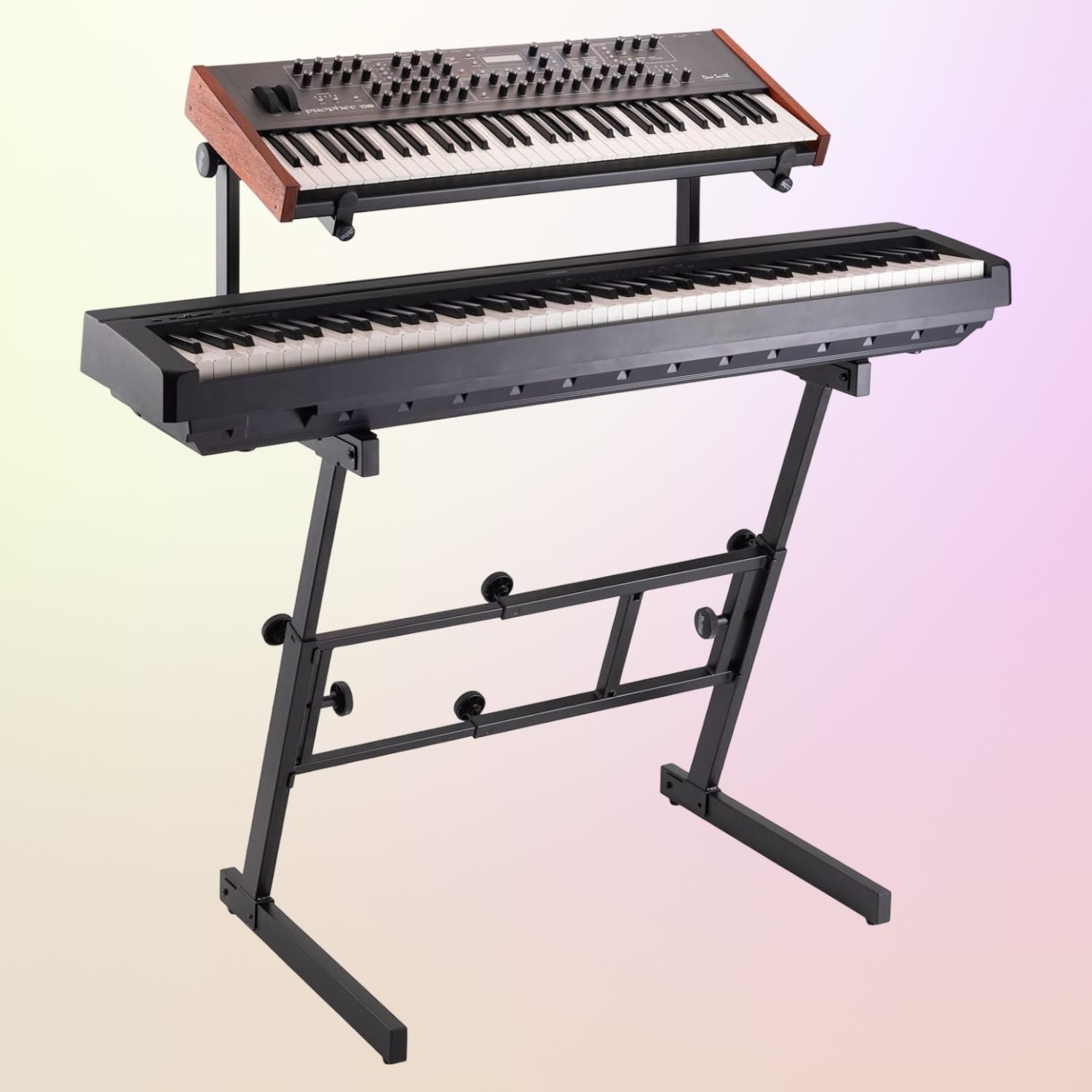 Angled view of On-Stage Folding-Z Keyboard Stand with Second Tier with keyboards mounted on yellow and pink gradient background
