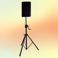 Angled view of On-Stage Power Crank-Up Speaker Stand with speaker mounted on yellow and orange background