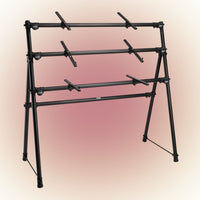 Angled front view of On-Stage Three-Tier A-Frame Keyboard Stand on maroon background