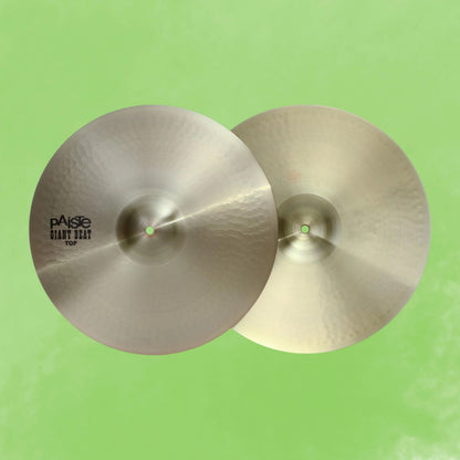Front view of Paiste 16" Giant Beat Hi-Hats on green background