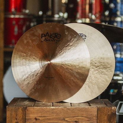 Front view of Paiste 16" Masters Thin Hi-Hats on wooden crate in studio