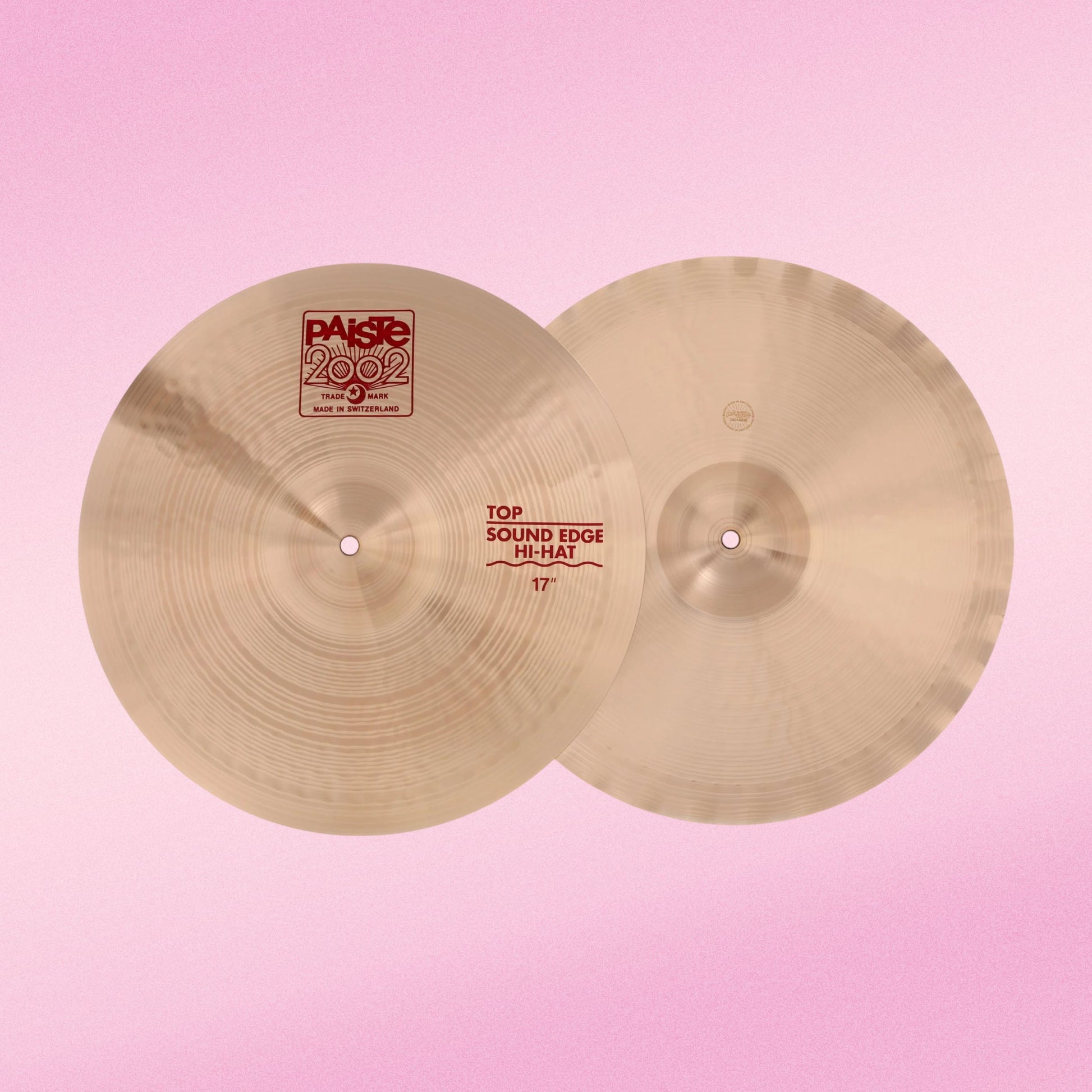 Front view of Paiste 17" 2002 Sound Edge Hi-Hats on pink background