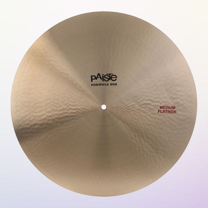 Front view of Paiste 20" Formula 602 Medium Flatride Cymbal on purple background