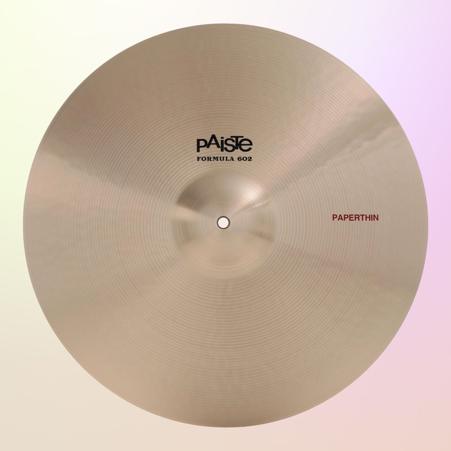 Front view of Paiste 20" Formula 602 Paperthin Crash Cymbal on multicolored background