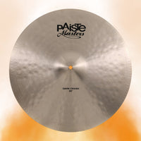 Front view of Paiste 20" Masters Dark Crash Cymbal on orange background