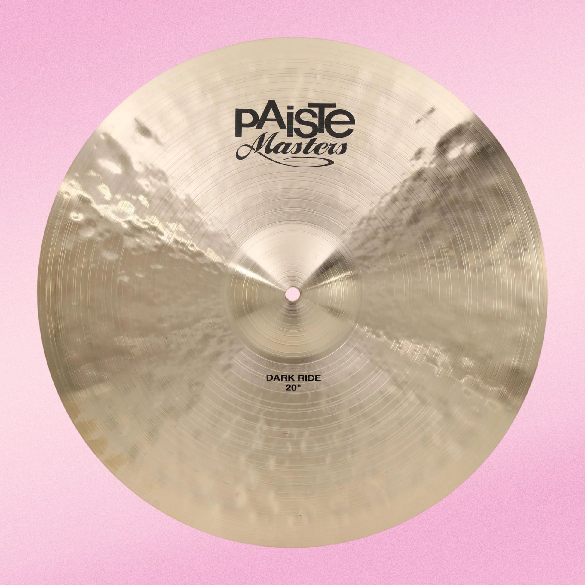 Front view of Paiste 20" Masters Dark Ride Cymbal on pink background