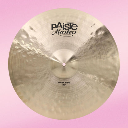 Front view of Paiste 20" Masters Dark Ride Cymbal on pink background