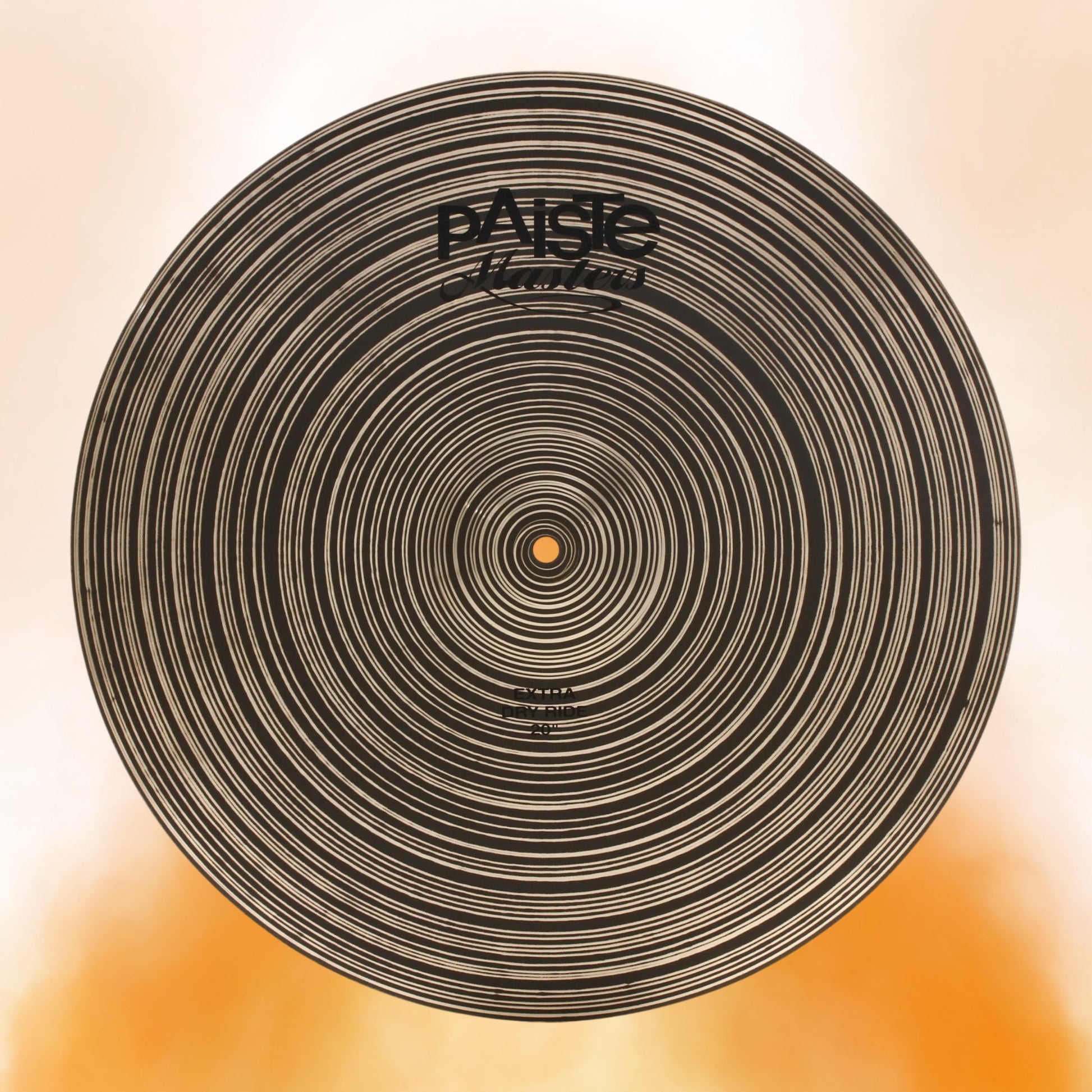 Front view of Paiste 20" Masters Extra Dry Ride Cymbal on orange background