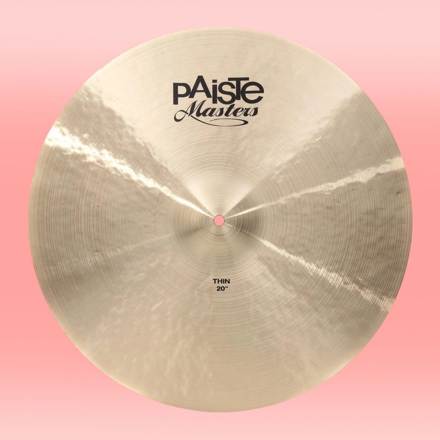 Front view of Paiste 20" Masters Thin Cymbal on pink background