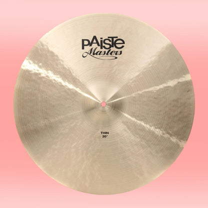 Front view of Paiste 20" Masters Thin Cymbal on pink background