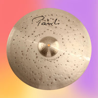 Front view of Paiste 20" Signature Dark Energy Mark II Ride Cymbal on multicolored background