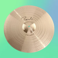 Front view of Paiste 20" Signature Full Crash Cymbal on green and blue background