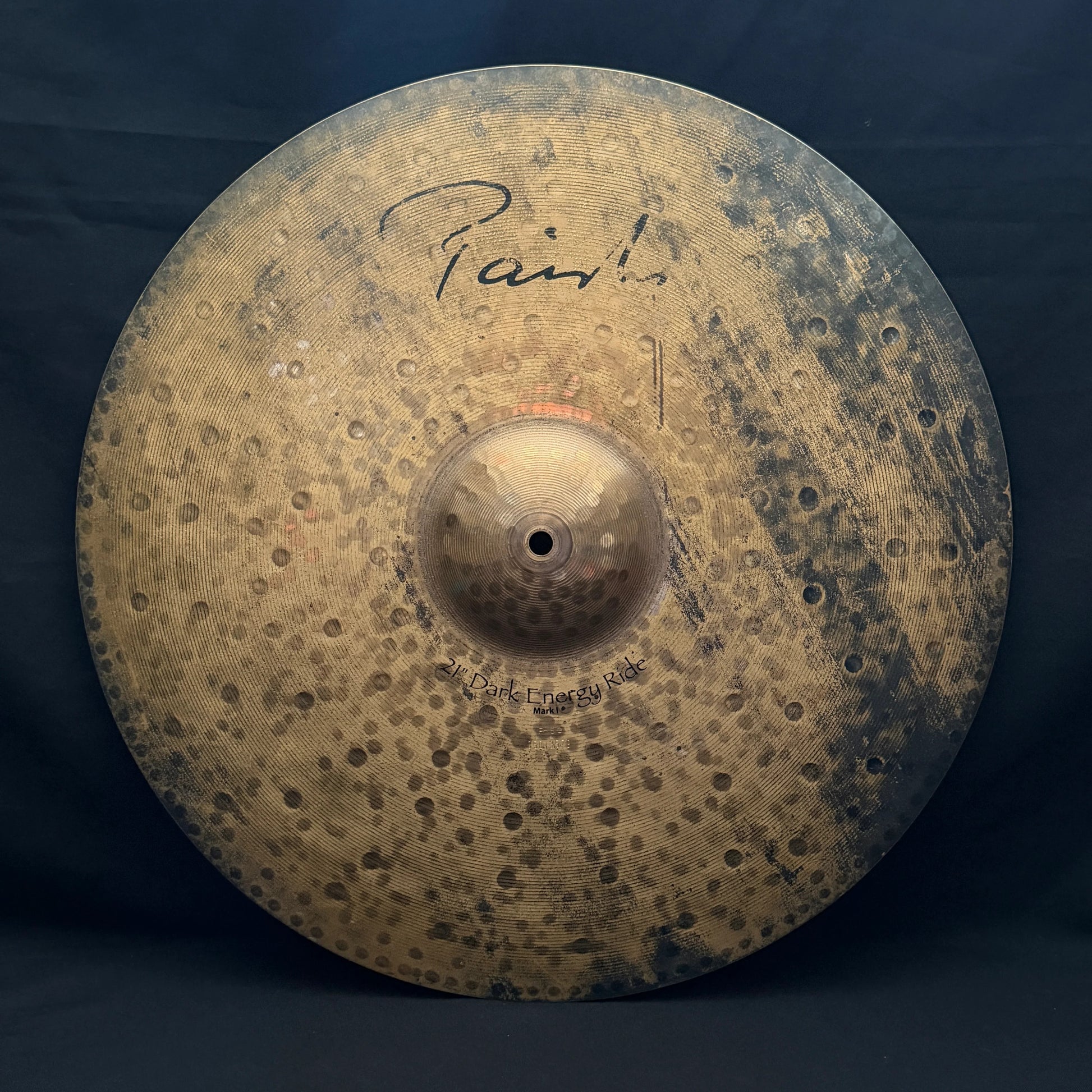 Front view of Paiste 21" Signature Dark Energy Ride Mark I Cymbal on black cloth