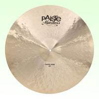 Front view of Paiste 22" Masters Dark Ride Cymbal on green background