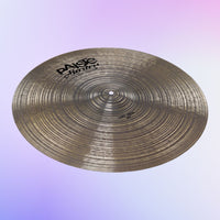 Angled view of Paiste 22" Masters Dry Ride Cymbal on purple background