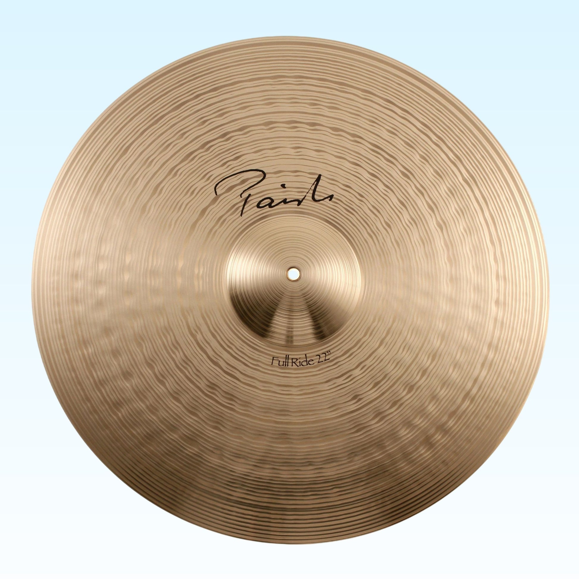Front view of Paiste 22" Signature Full Ride Cymbal on blue background
