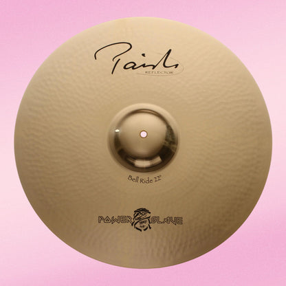 Front view of Paiste 22" Signature Reflector Bell Ride “Powerslave” Cymbal on pink background