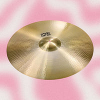 Angled view of Paiste 24" Giant Beat Cymbal on pink background
