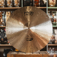 Front view of Paiste 24" Masters Deep Ride Cymbal on wooden crate in studio