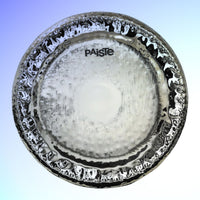 Front view of Paiste 32" Symphonic Gong Brilliant on blue background