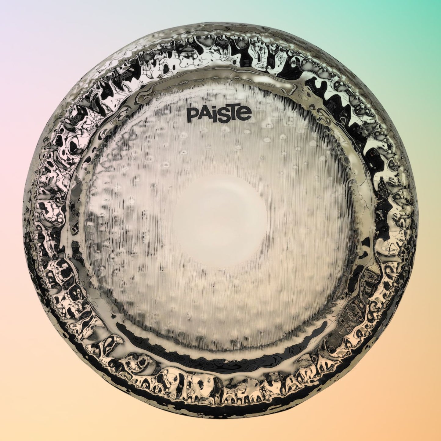 Front view of Paiste 38" Symphonic Gong Brilliant on orange and green gradient background