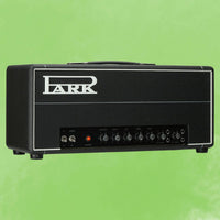 Angled view of Park P50M Custom Guitar Amplifier Head on green background