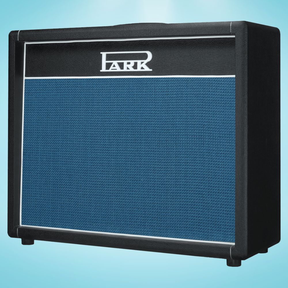 Angled view of Park S1-212 (Angled Grill) Speaker Cabinet on blue background