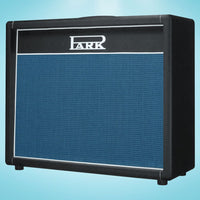 Angled view of Park S1-212 (Angled Grill) Speaker Cabinet on blue background