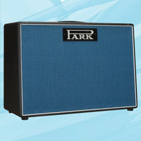 Angled view of Park SA-212 (Angled Grill) Speaker Cabinet on blue background
