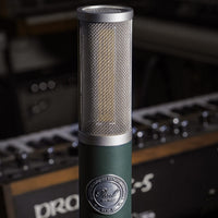 Close up view of Pearl Microphone Labs ELM-T Single with studio background