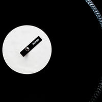 Top view of vinyl record with Phase Magnetic Sticker attached