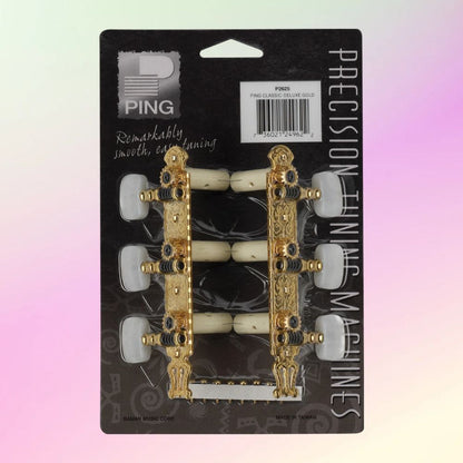 Ping P2625 Deluxe Gold Lyra Plate Classic Machine Heads in packaging on pink and yellow gradient background