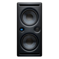 Black studio monitor speaker with digital display on a white background