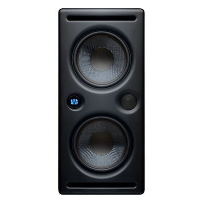 Black studio monitor speaker with digital display on a white background