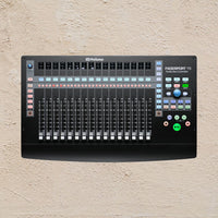 PreSonus FaderPort 16 audio interface on a beige surface