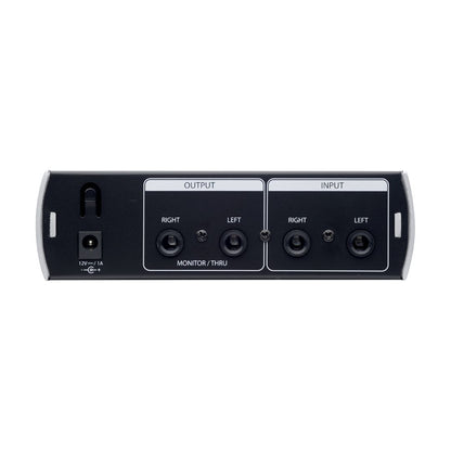 Audio interface with input and output ports on a white background
