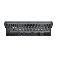 Back view of a audio mixer with various inputs and outputs on a white background