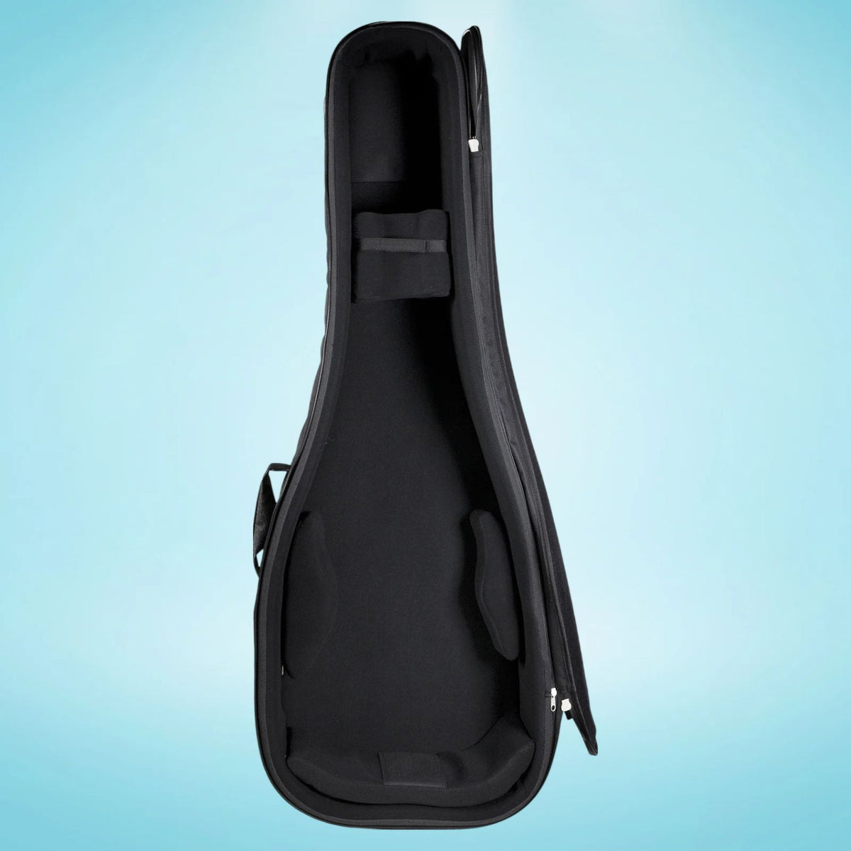 Internal view of Protection Racket 7053-00 Standard Acoustic Guitar Case on blue background