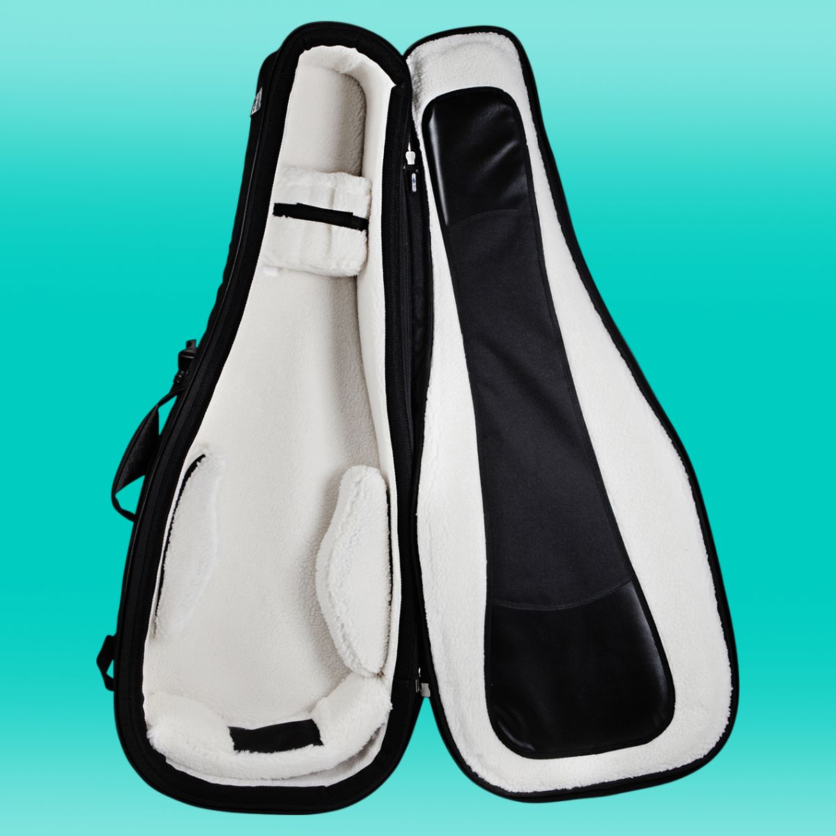 Inside view of Protection Racket 7152-00 Deluxe Classical Guitar Case on blue background