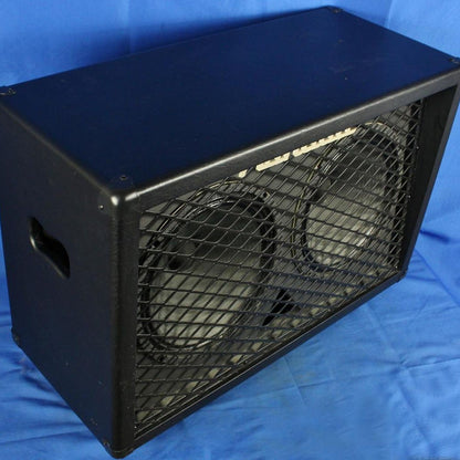 Angled view of Randall RD212-V30 Guitar Speaker Cabinet on blue cloth background